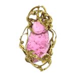 A PINK TOURMALINE PENDANT, 1972 in 18ct yellow gold set with a large, polished pink tourmaline