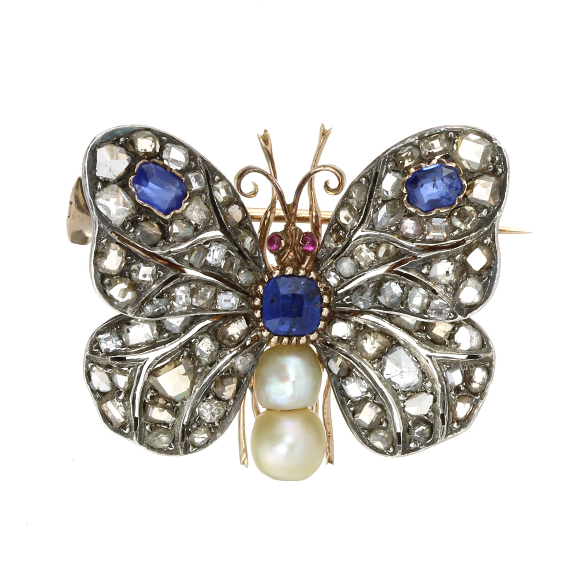 AN ANTIQUE SAPPHIRE, PEARL, RUBY AND DIAMOND BUTTERFLY BROOCH in high carat gold and silver, in