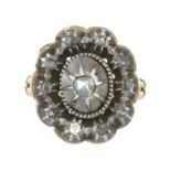 AN ANTIQUE DUTCH DIAMOND CLUSTER RING in high carat yellow gold and silver set with a central rose