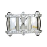 A SAPPHIRE AND DIAMOND TWENTY-4 RING BY PATEK PHILIPPE in 18ct white gold, designed with off-set