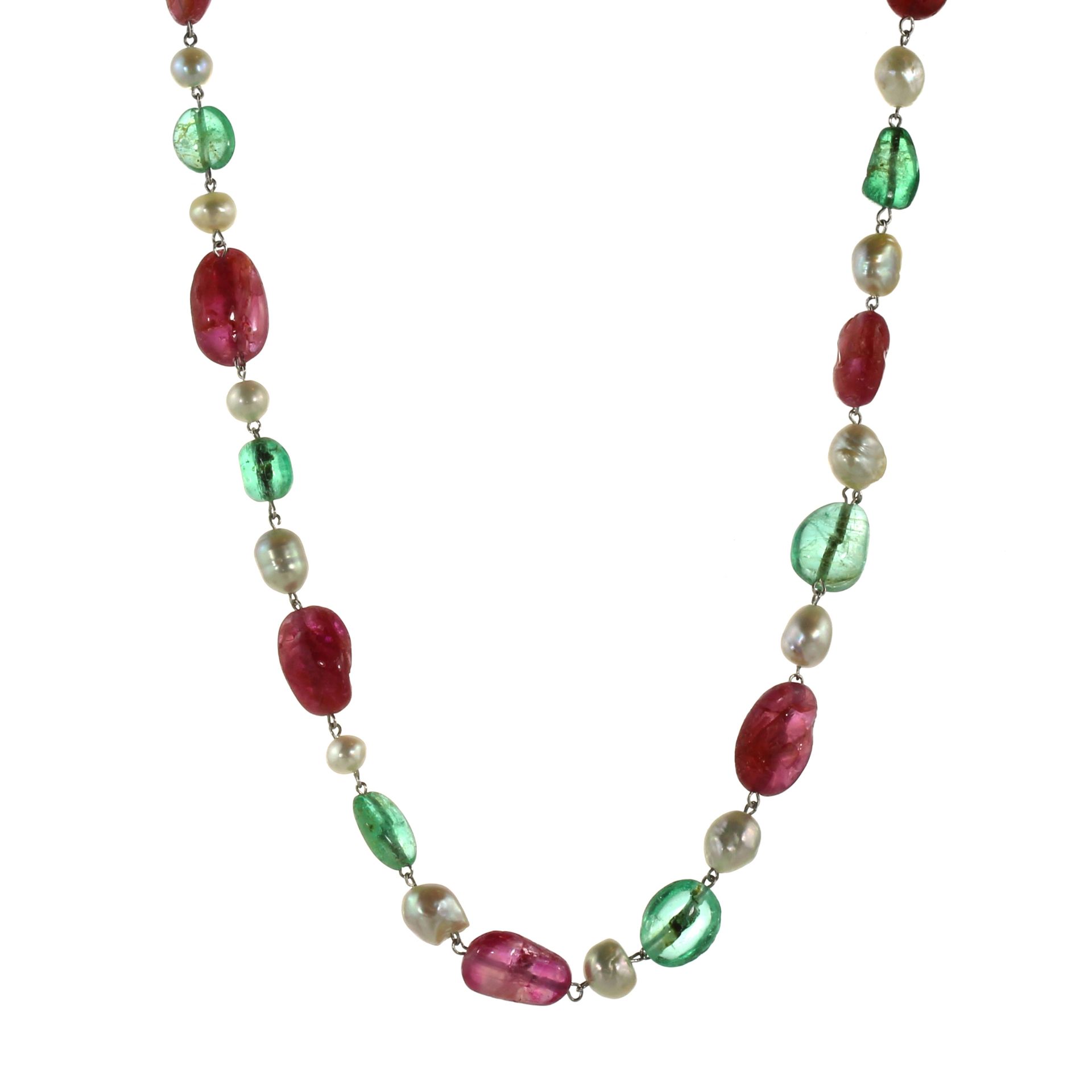 A BURMA RUBY, COLOMBIAN EMERALD AND NATURAL SALTWATER PEARL NECKLACE in white gold or platinum