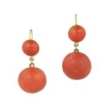 A PAIR OF ANTIQUE CORAL DROP EARRINGS in 18ct yellow gold each set with a large coral cabochon of