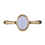 AN ANTIQUE HARDSTONE SEAL RING, 1927 in yellow gold set with an oval piece blue and red hardstone.