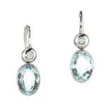 A PAIR OF AQUAMARINE AND DIAMOND DROP EARRINGS in 18ct white gold, each set with an oval cut