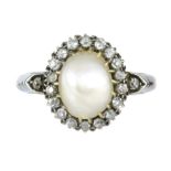 AN ANTIQUE NATURAL SALTWATER PEARL AND DIAMOND CLUSTER RING in yellow and white gold, set with a
