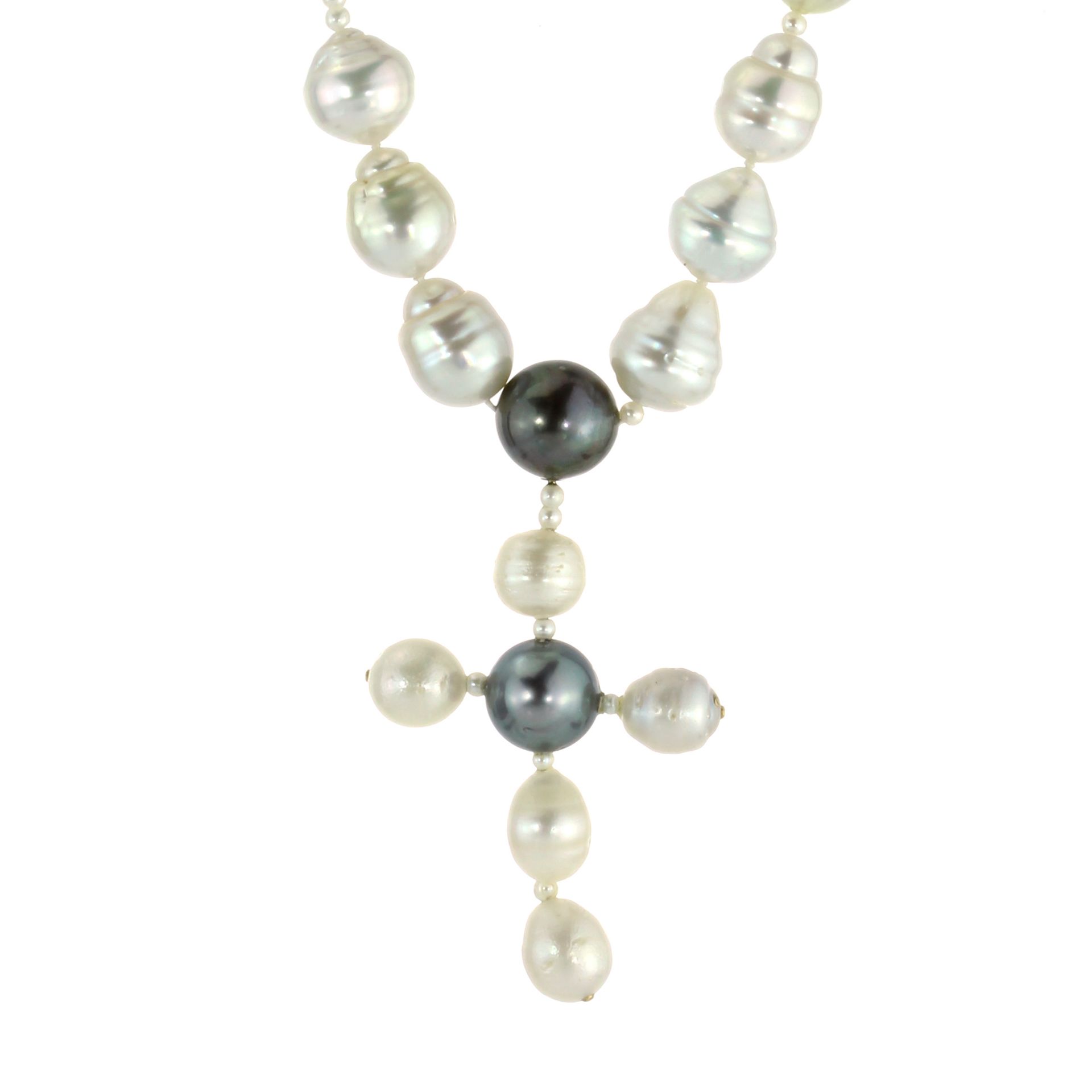 A SOUTH SEA PEARL CRUCIFIX / CROSS NECKLACE comprising a single row of large pearls punctuated