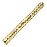 A FANCY LINK BRACELET CIRCA 1970 in 18ct yellow gold the bevelled body formed of openwork gold scale
