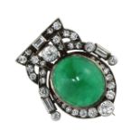 AN ANTIQUE EMERALD AND DIAMOND BROOCH in yellow and white gold, set with an oval cabochon emerald of