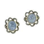 A PAIR OF SAPPHIRE AND DIAMOND CLUSTER EARRINGS in yellow gold and silver, each set with an oval