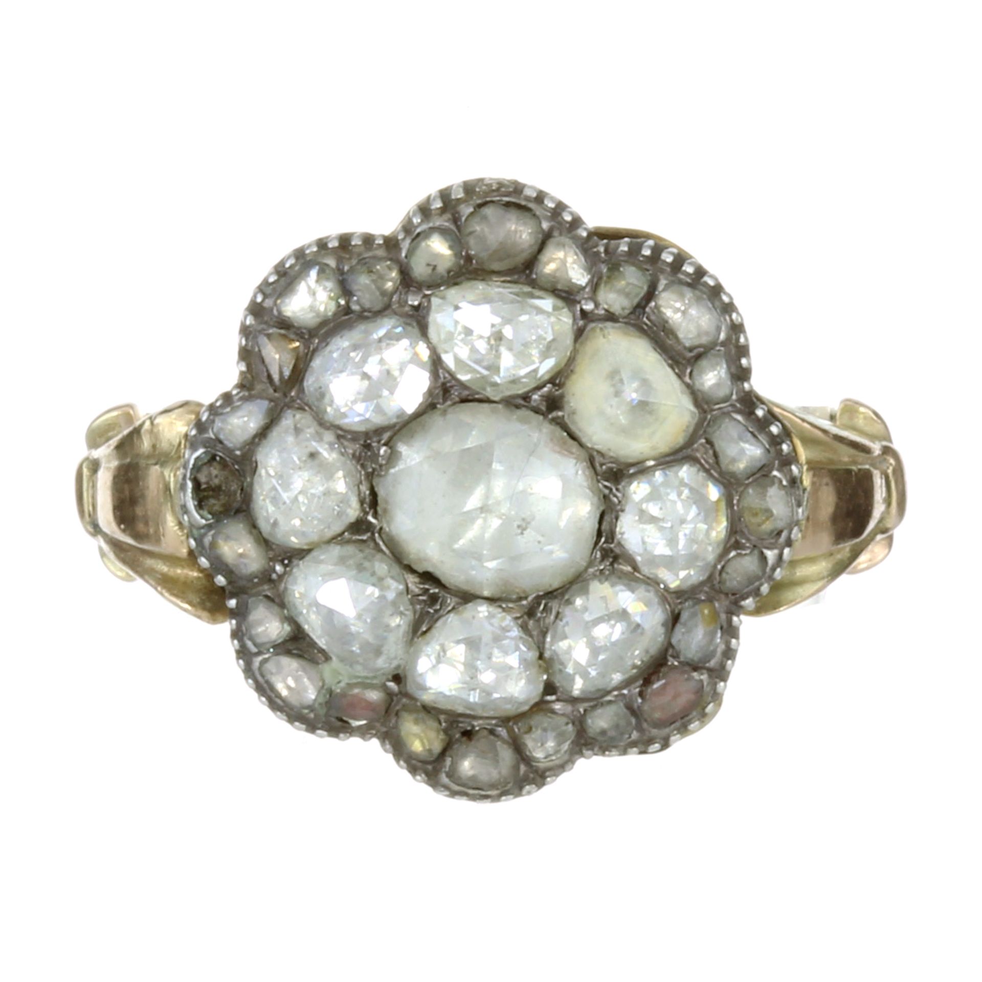 A DIAMOND CLUSTER RING, 19TH CENTURY in high carat yellow gold and silver, set with a central rose