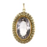 AN ANTIQUE AMETHYST AND PEARL PENDANT in yellow gold, set with a central oval cut amethyst of 10.