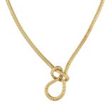 A FANCY TWISTED GOLD NECKLACE in 18ct yellow gold designed as a gold snake chain tied in a knot