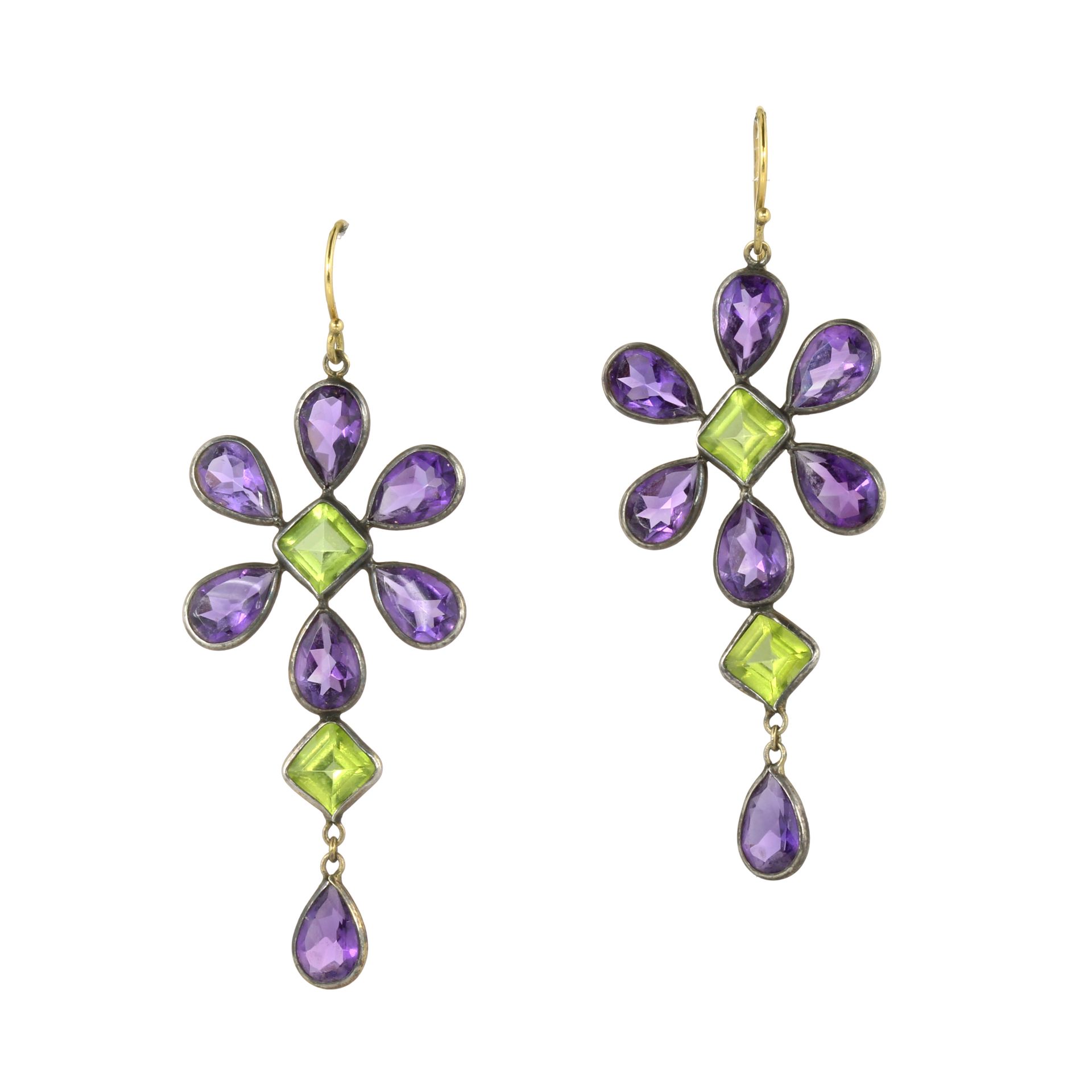 A PAIR OF AMETHYST AND PERIDOT DROP EARRINGS in gold and silver, each designed as a flower motif