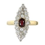 AN ANTIQUE RUBY AND DIAMOND DRESS RING in 18ct yellow gold set with a central oval cut ruby of 0.