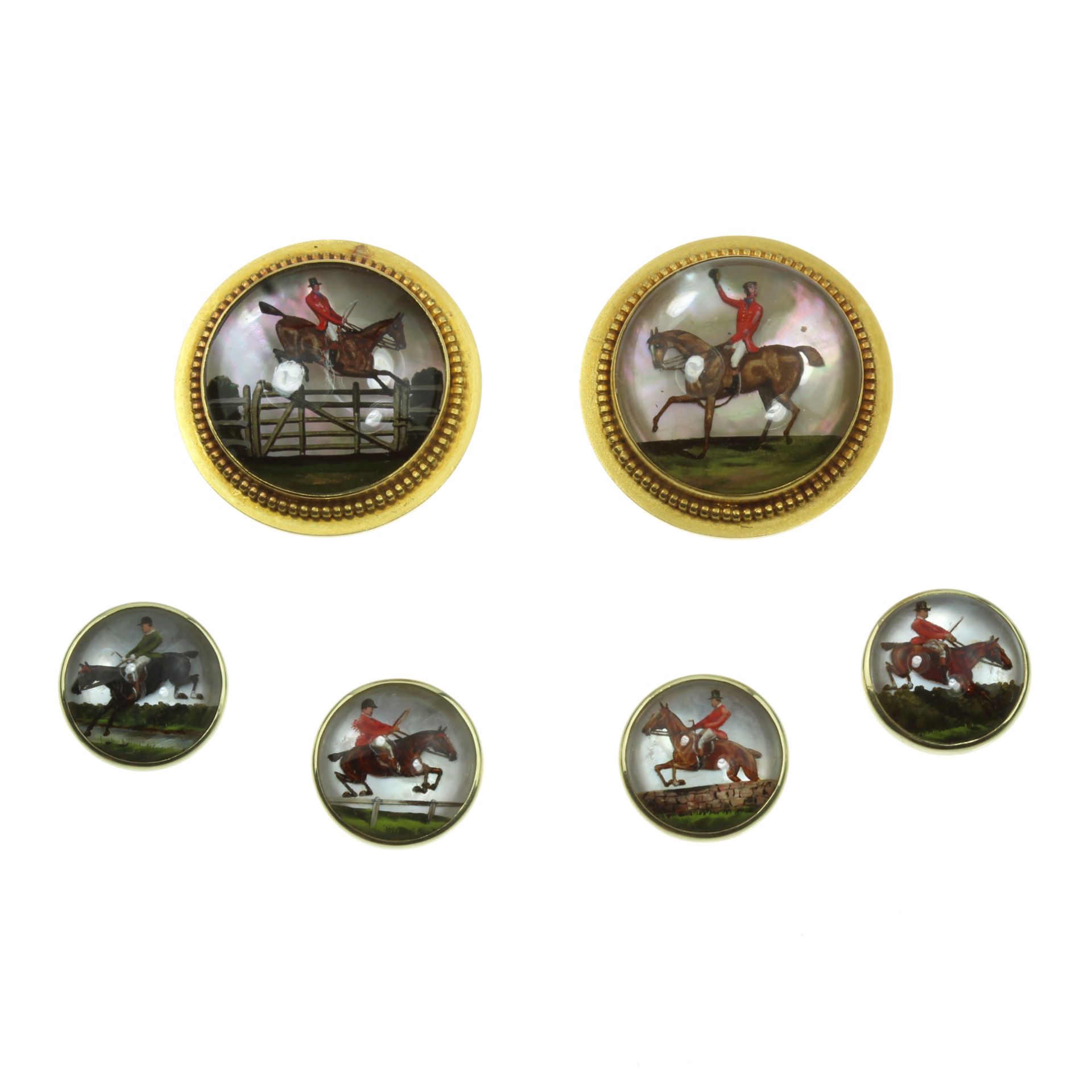 AN ANTIQUE EQUESTRIAN ESSEX CRYSTAL CUFFLINKS AND SHIRT BUTTON DRESS SET in high carat yellow gold