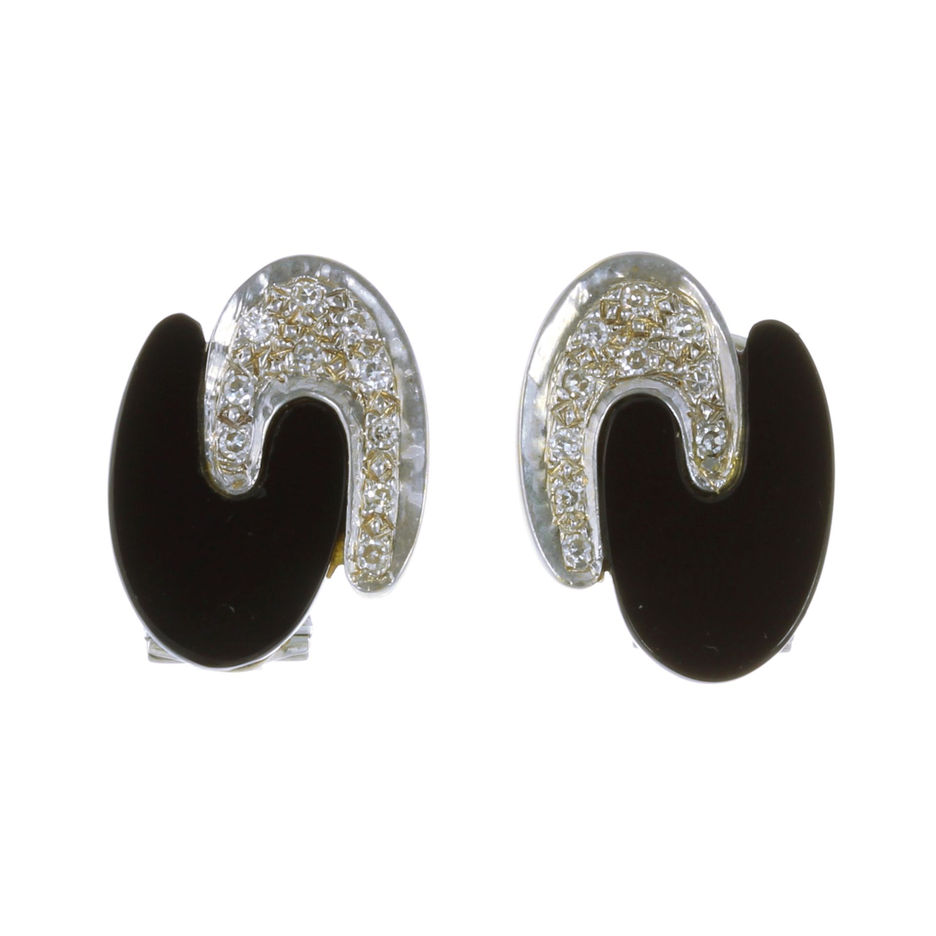A PAIR OF ONYX AND DIAMOND CLIP EARRINGS, CIRCA 1973 in 18ct white gold, each designed as two