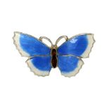 AN ANTIQUE ENAMEL BUTTERFLY BROOCH in sterling silver, designed as a butterfly, its body and wings