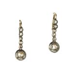 A PAIR OF ANTIQUE DIAMOND DROP EARRINGS in yellow gold and silver each designed as a row of five