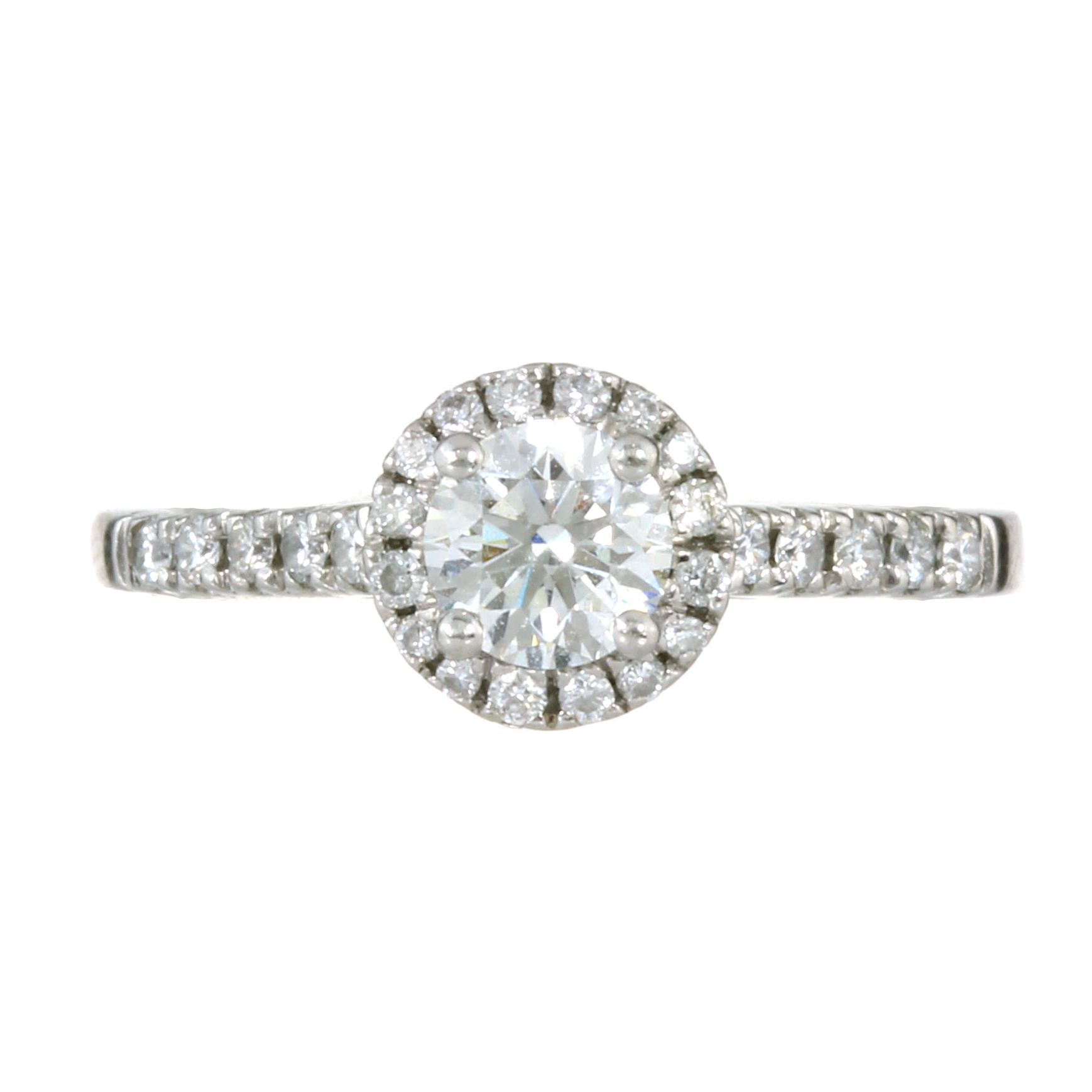 A 0.50 CARAT SOLITAIRE DIAMOND HALO ENGAGEMENT RING in platinum set with a round brilliant cut