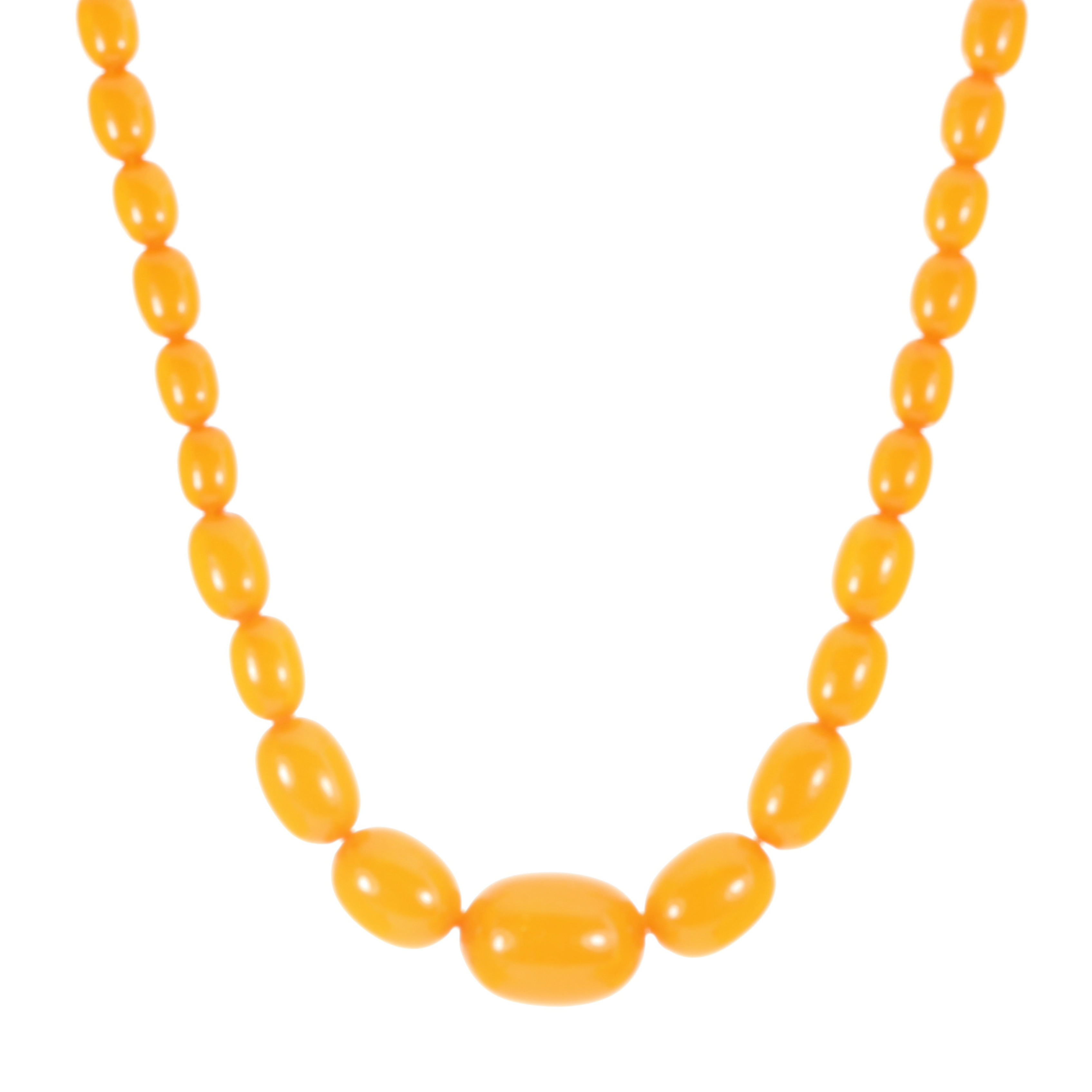 AN AMBER BEAD NECKLACE comprising a single row of forty-three graduated polished oval beads up to