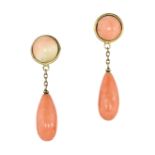 A PAIR OF ANTIQUE CORAL DROP EARRINGS in yellow gold each set with a polished briolette piece of