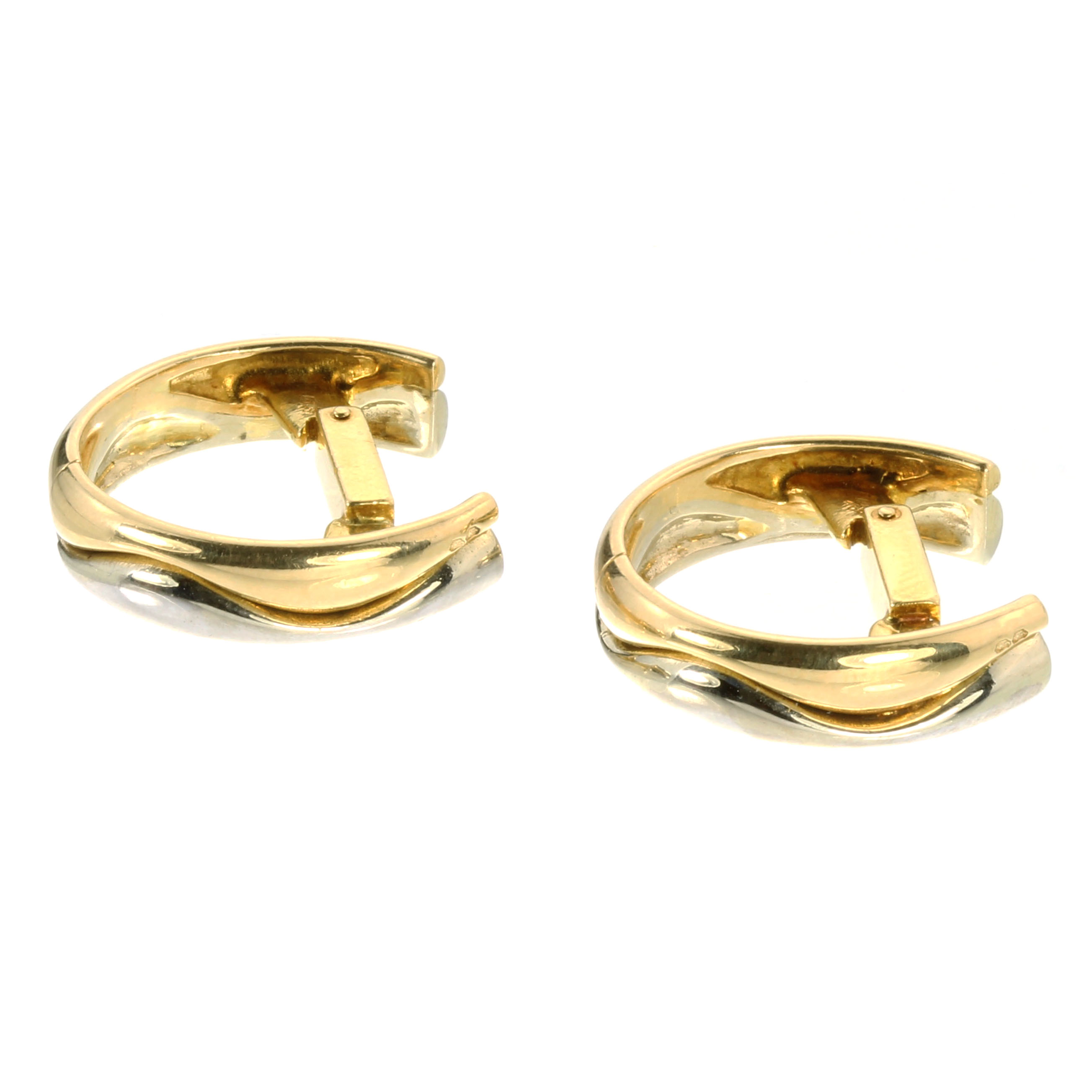 A VINTAGE PAIR OF CUFFLINKS, CARTIER in 18ct yellow and white gold, each incomplete hoop designed