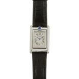 A CARTIER TANK BASCULANTE LADIES WRIST WATCH in stainless steel, the rectangular reversible face