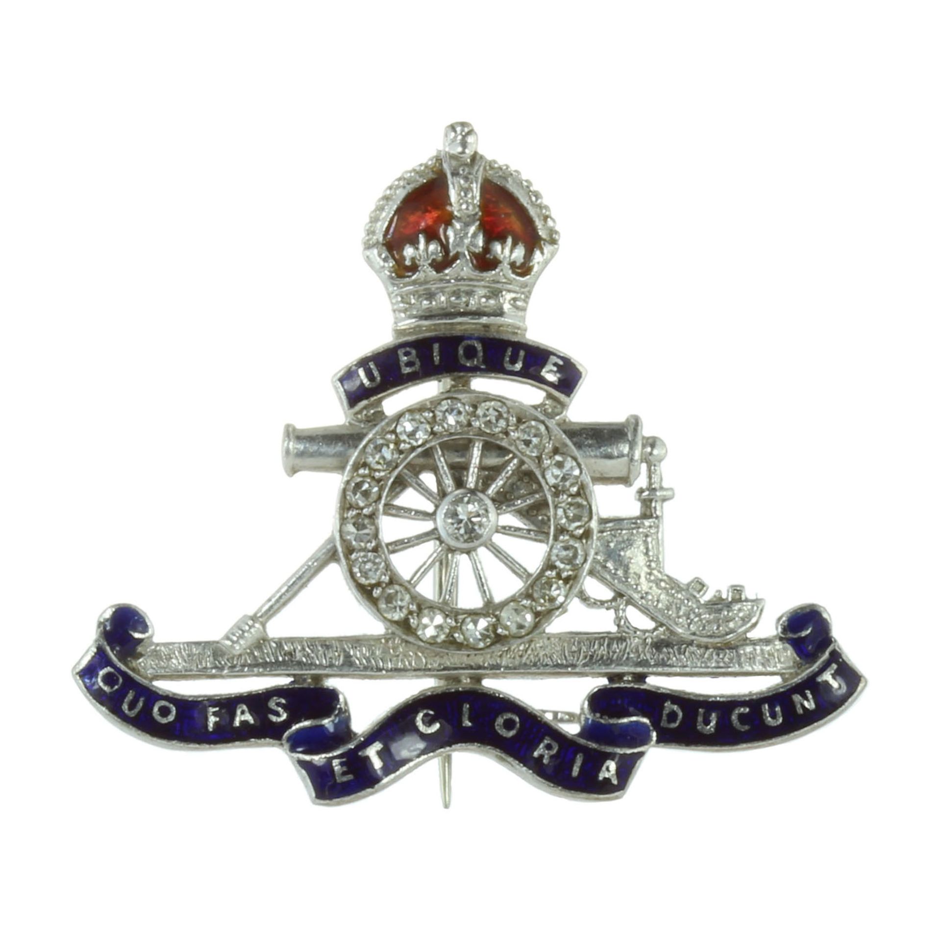 AN ANTIQUE REGIMENTAL ROYAL ARTILLERY DIAMOND AND ENAMEL BROOCH / CAP BADGE in 18ct white gold and