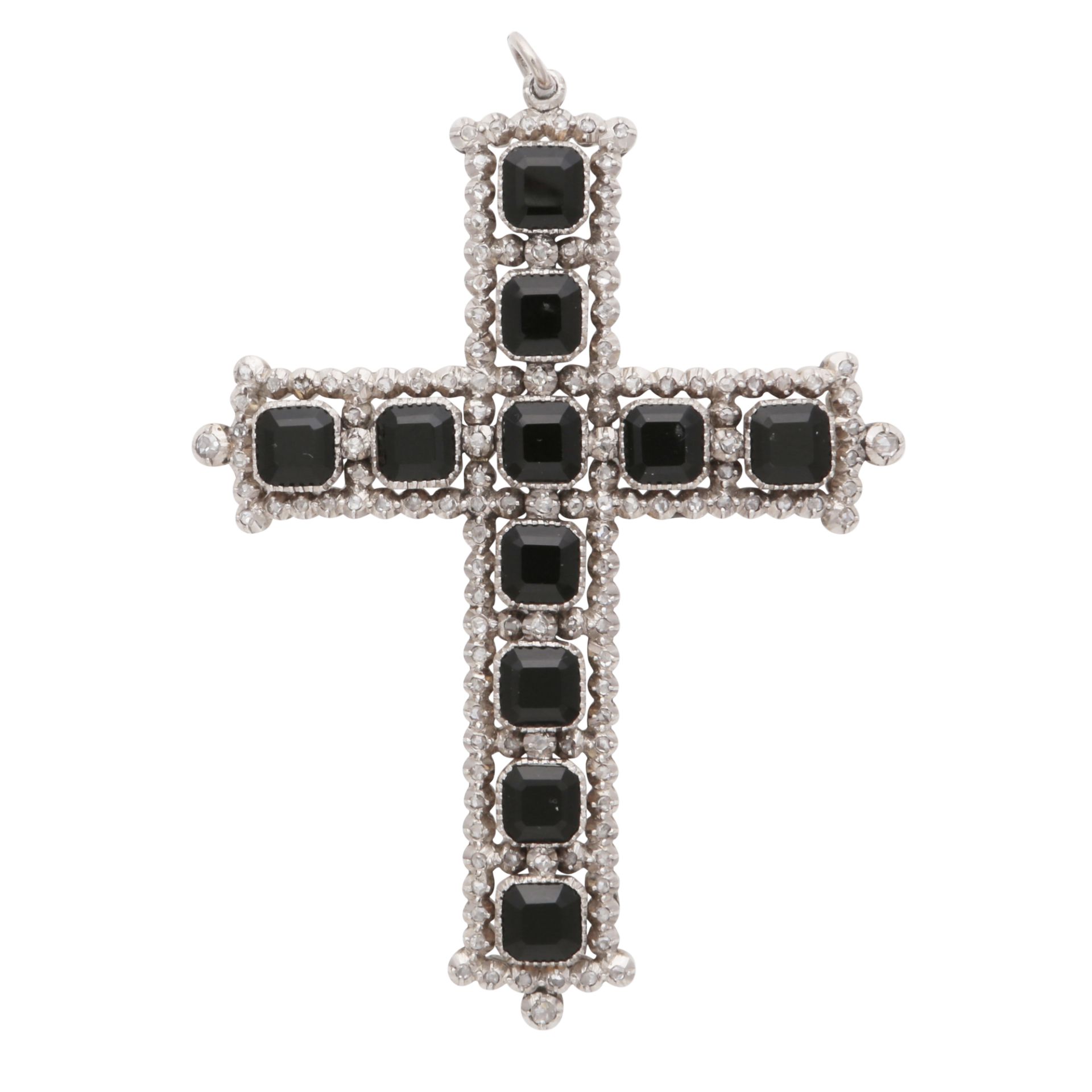 AN ANTIQUE ONYX AND DIAMOND CRUCIFIX PENDANT the four arms set with step cut black onyx gemstones,