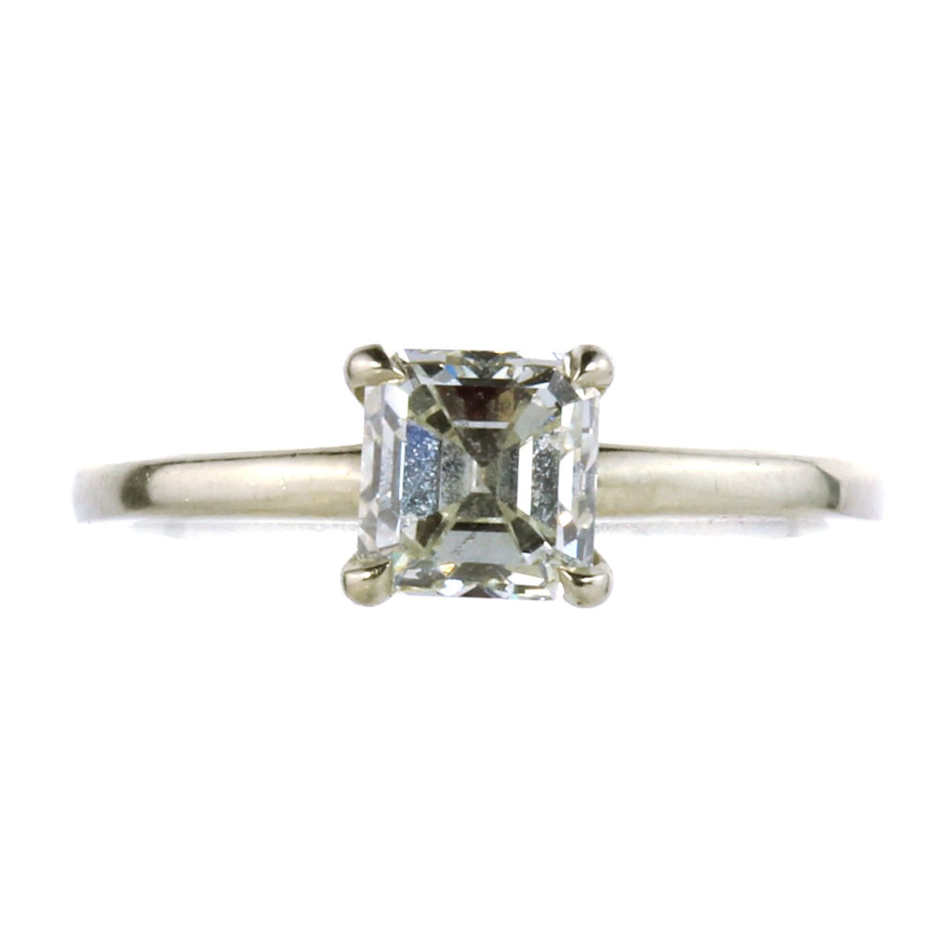 A 1.08 CARAT SOLITAIRE DIAMOND ENGAGEMENT RING in white gold, set with a single princess cut diamond