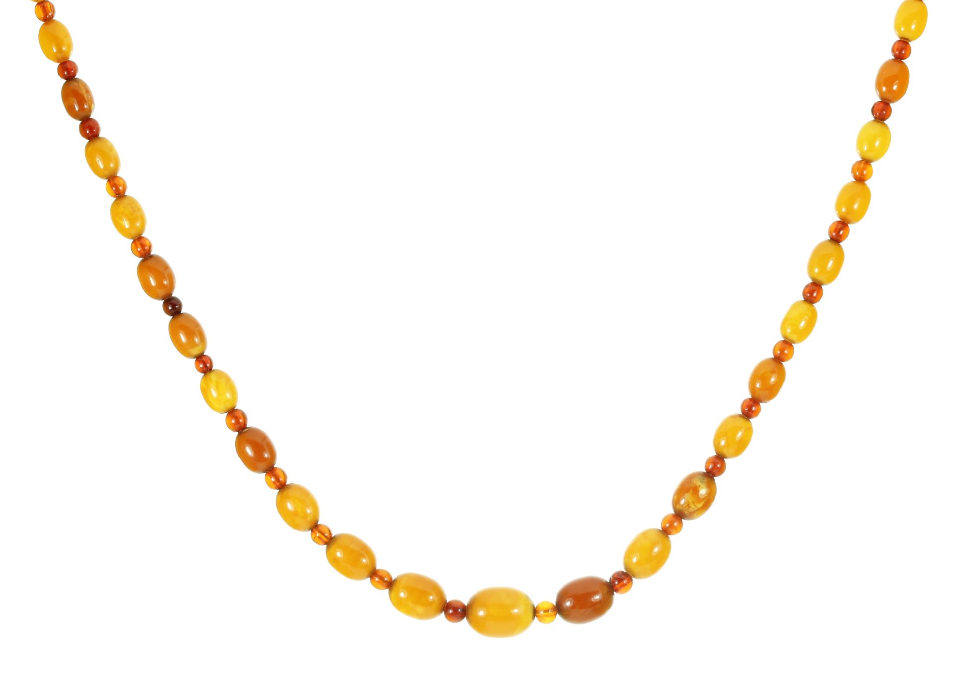 AN ANTIQUE NATURAL AMBER BEAD NECKLACE comprising a single row of forty-one gradated polished oval