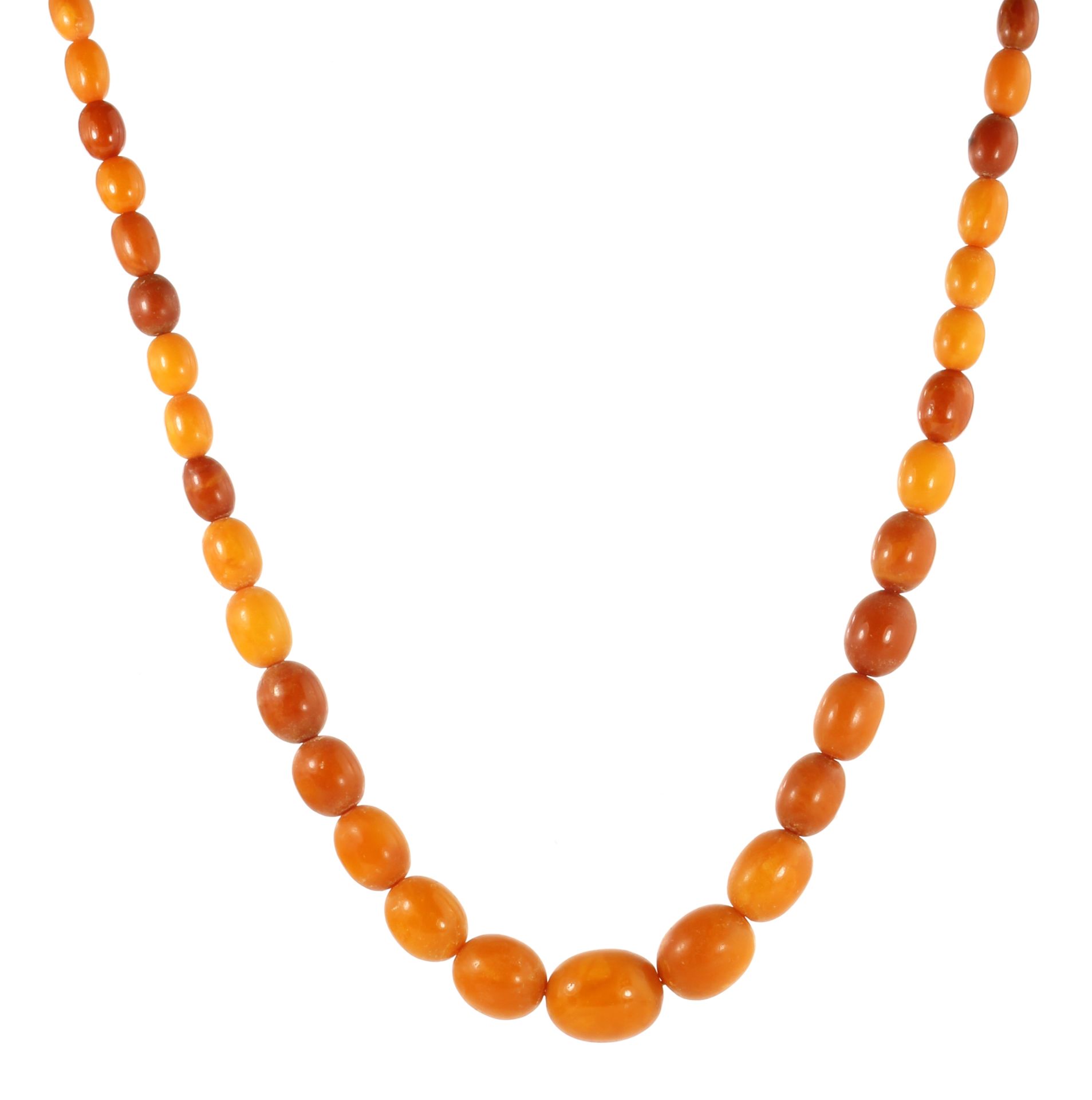 A NATURAL AMBER BEAD NECKLACE comprising a single row of eighty-three graduated polished oval