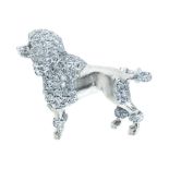 A RUBY AND DIAMOND POODLE BROOCH in yellow gold and silver, designed as a poodle, standing, its body