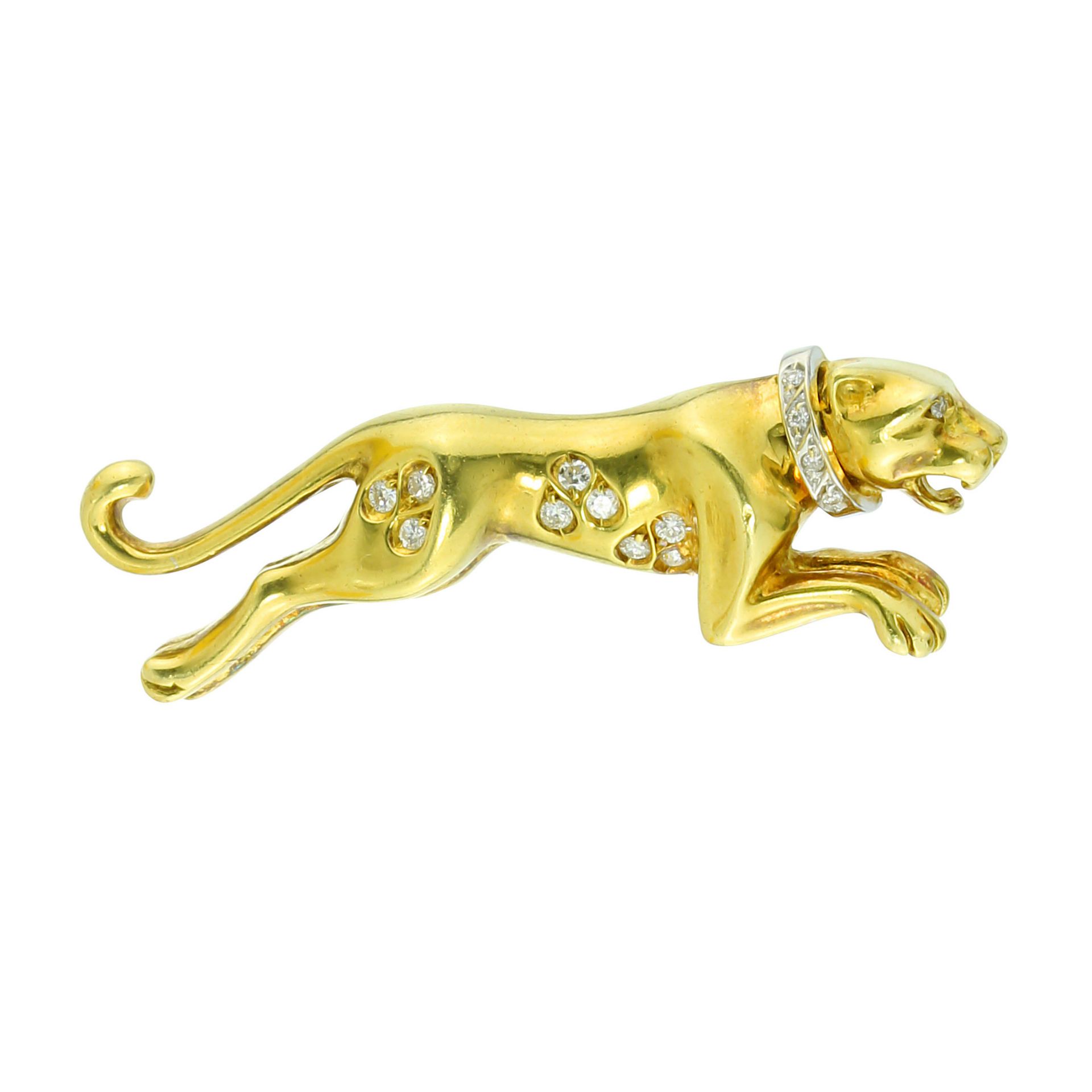 A DIAMOND PANTHERE / PANTHER BROOCH in high carat yellow gold, in the manner of Cartier, designed as