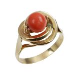 A CORAL BEAD DRESS RING in high carat yellow gold, set with a coral bead of 6.9mm, in an openwork