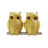 A RUBY AND DIAMOND OLD BROOCH in 18ct yellow gold, depicting a pair of owls cast in detail, with