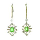 A PAIR OF ANTIQUE PASTE DROP EARRINGS each set with a green paste stone within filigree wirework