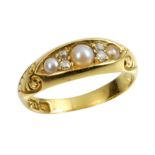 AN ANTIQUE PEARL AND DIAMOND DRESS RING in 18ct yellow gold, set with three graduated pearls