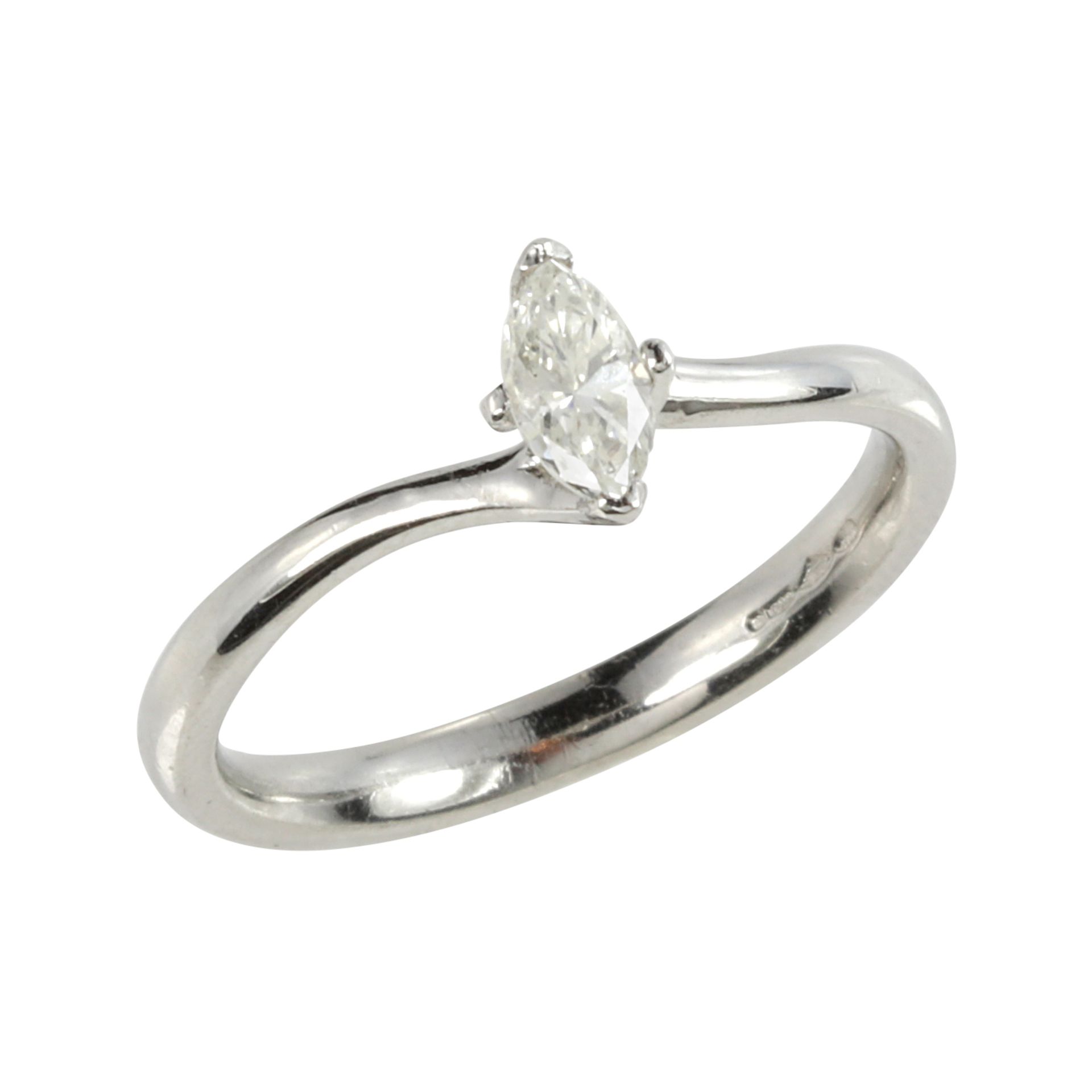 A 0.35 CARAT SOLITAIRE DIAMOND RING in platinum, set with a single marquise cut diamond of 0.35