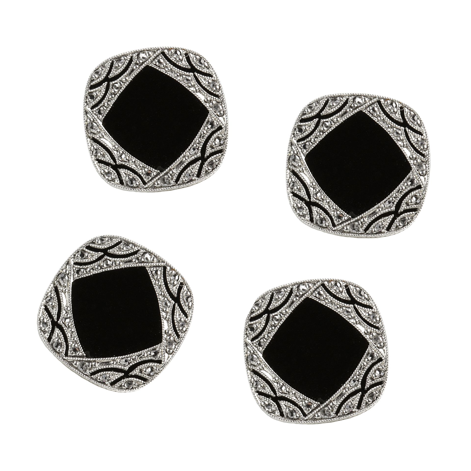 A SET OF FOUR ANTIQUE BLACK ONYX AND DIAMOND SHIRT BUTTON STUDS in 18ct white gold, each of
