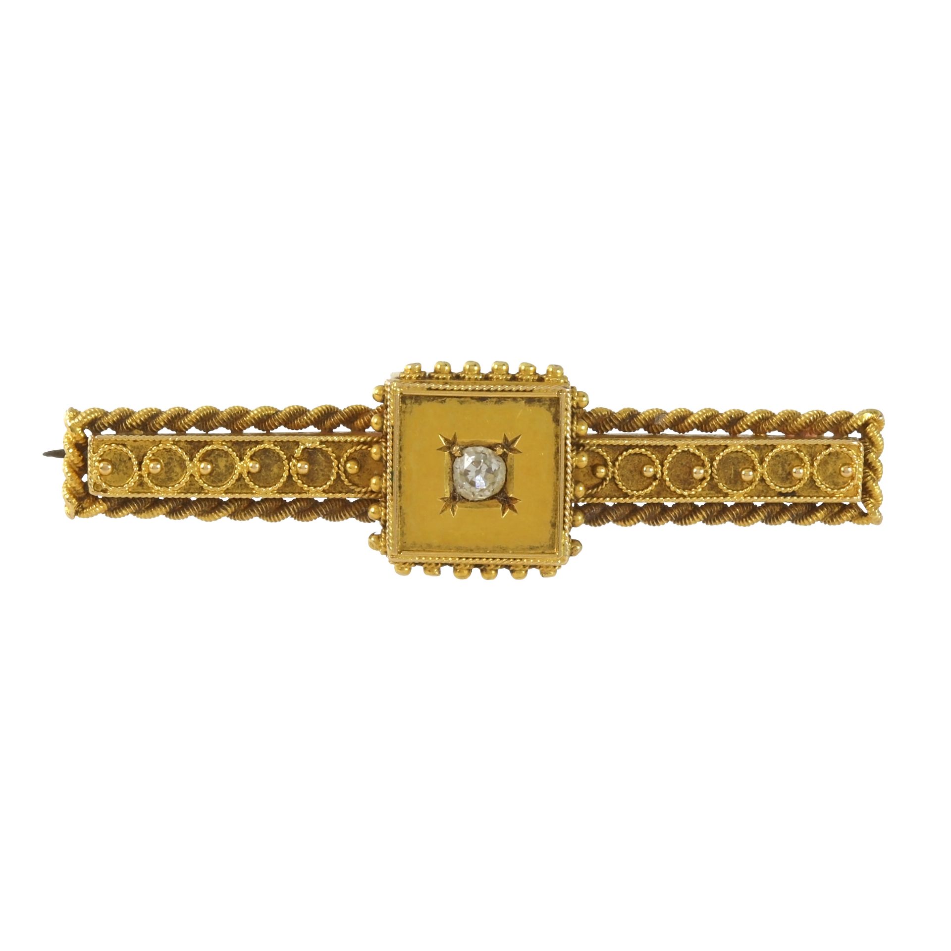 AN ANTIQUE DIAMOND BROOCH, LATE 19TH CENTURY in 15ct yellow gold, in the Etruscan revival style, the