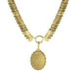 AN ANTIQUE LOCKET NECKLACE, 19TH CENTURY in high carat yellow gold the oval locket with beaded