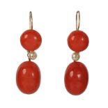 A PAIR OF ANTIQUE CORAL AND PEARL EARRINGS in high carat yellow gold, each set with a large coral