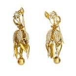 A PAIR OF NATURAL PEARL DROP EARRINGS in high carat yellow gold, each designed with floral motifs