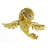 A VINTAGE SAPPHIRE BIRD BROOCH, RENÉ KERN CIRCA 1970 in 18ct yellow gold, designed as a bird in