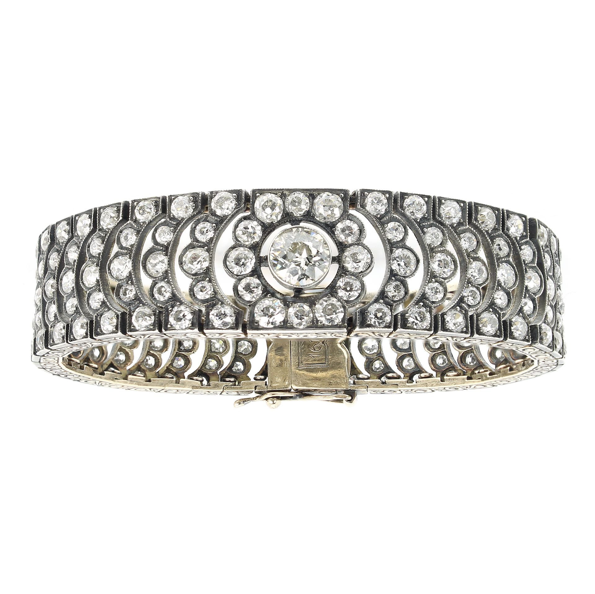 AN ANTIQUE 16.15 CARAT DIAMOND BRACELET CIRCA 1880 in high carat yellow gold and silver, the