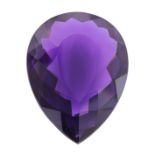 A FACETED AMETHYST JEWEL of modified pear cut, weighing approximately 146 carats.