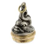 A NOVELTY ROLLING DICE PENDANT / FOB designed as a fob, decorated with the body of a dolphin, the