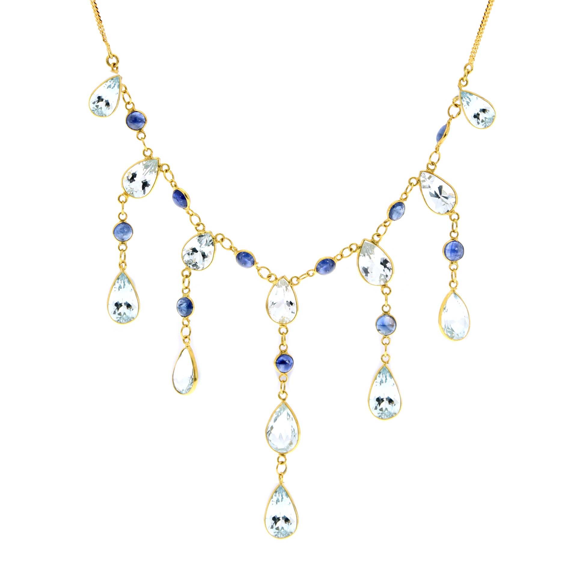 AN AQUAMARINE AND SAPPHIRE DROP NECKLACE in 14ct yellow gold, comprising seven graduated drops