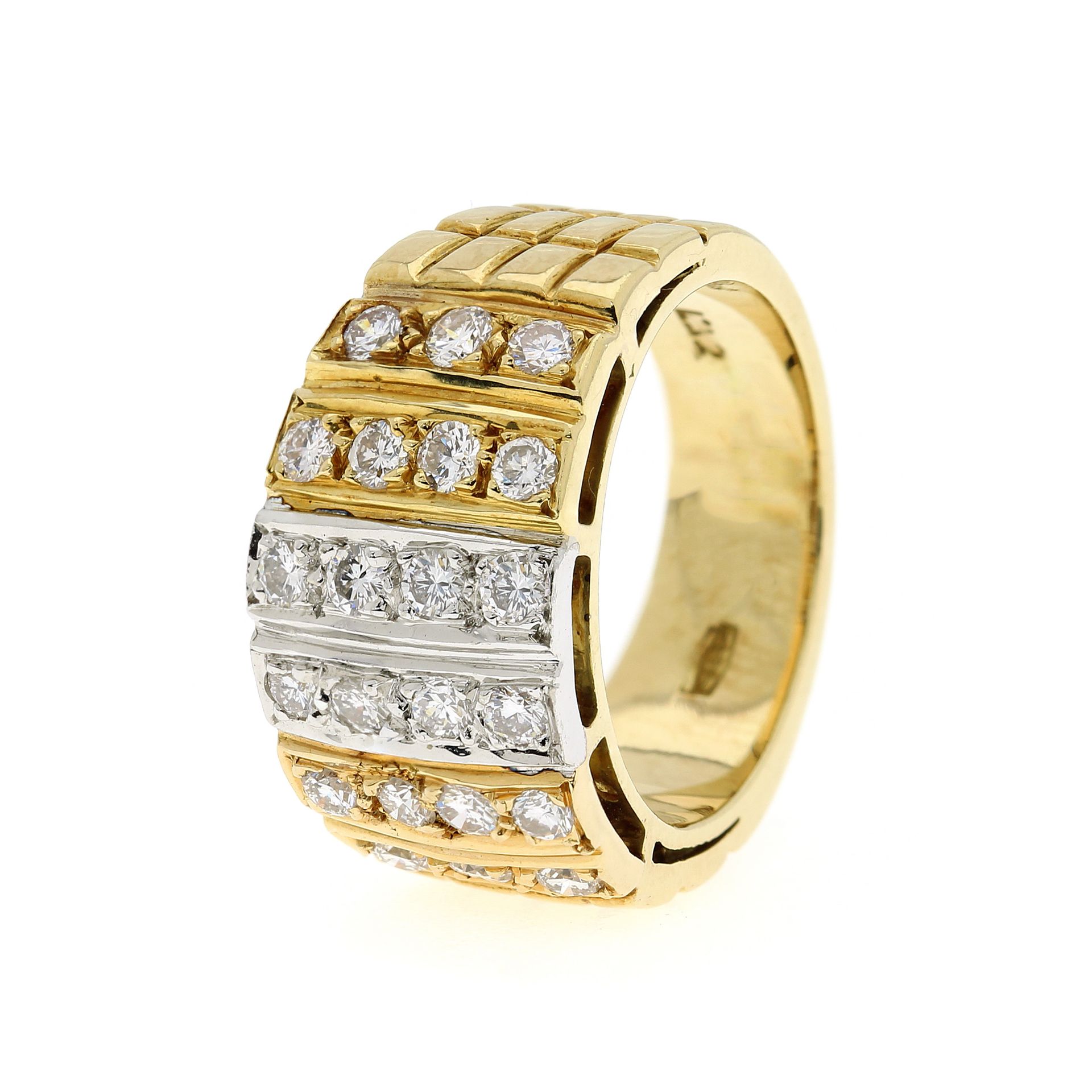 A DIAMOND DRESS RING in 18ct white and yellow gold, the graduated body set with six rows of round